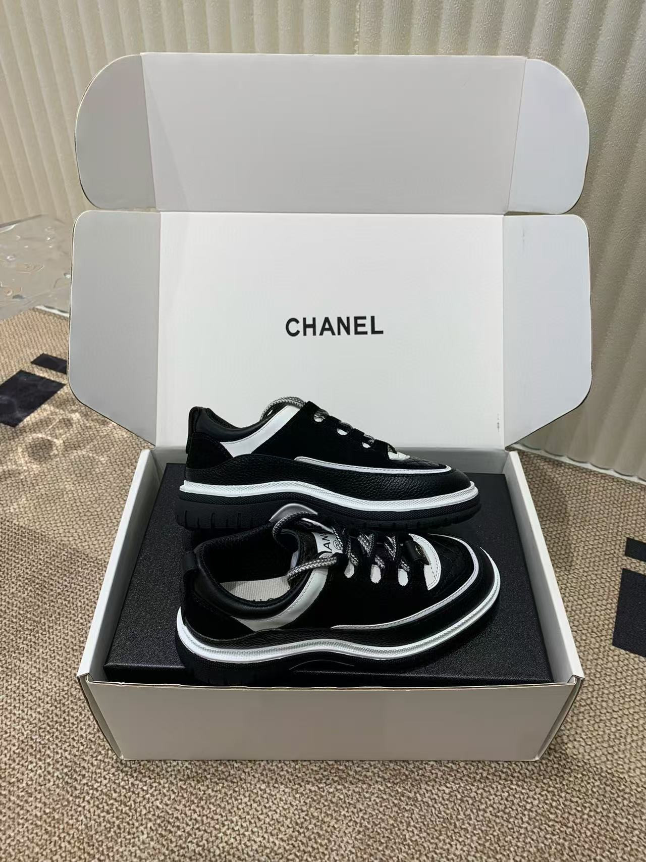 UA Ch*el Sneaker