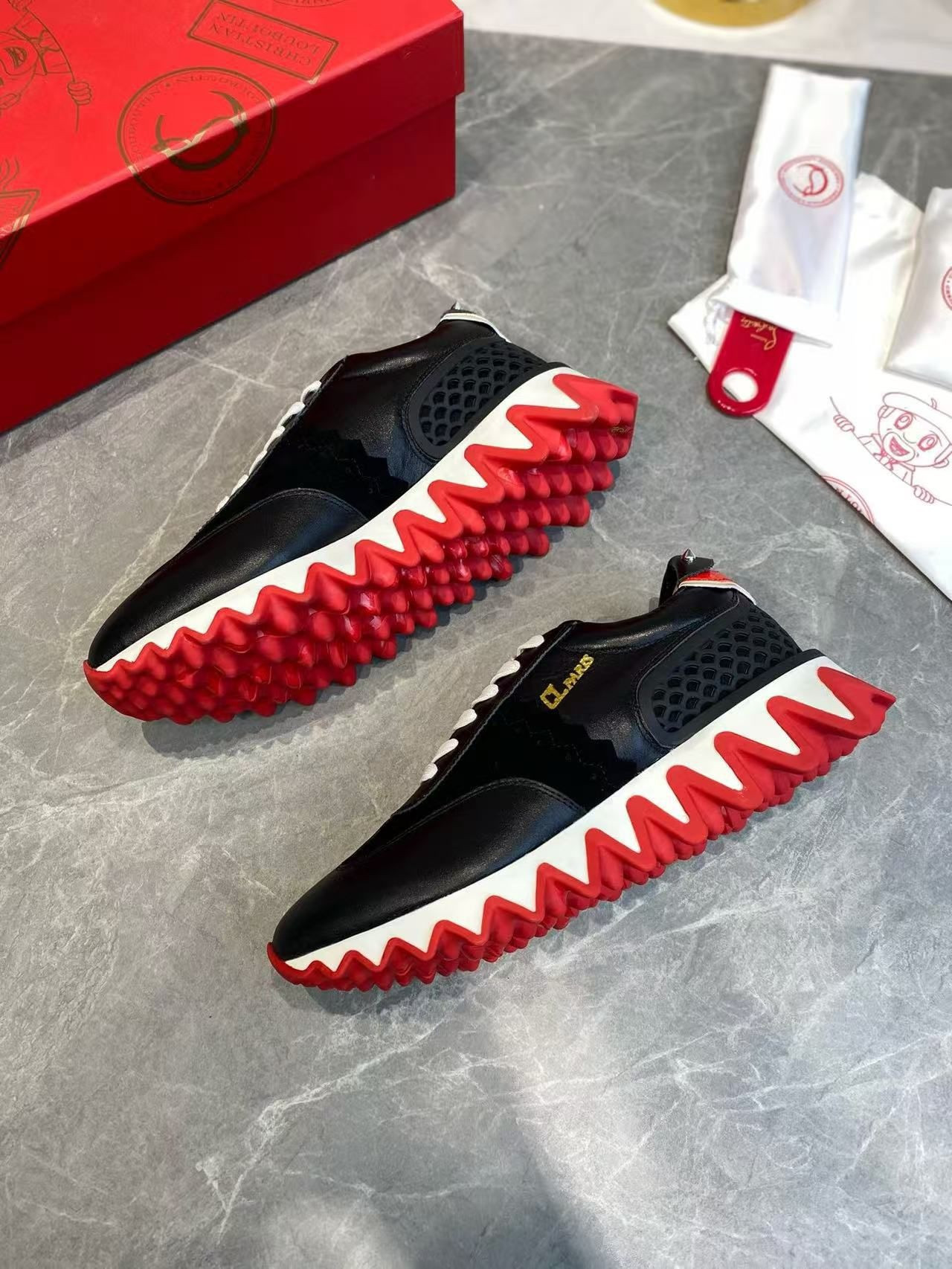 UA Ch**an Louboutin Loubishark Sneaker