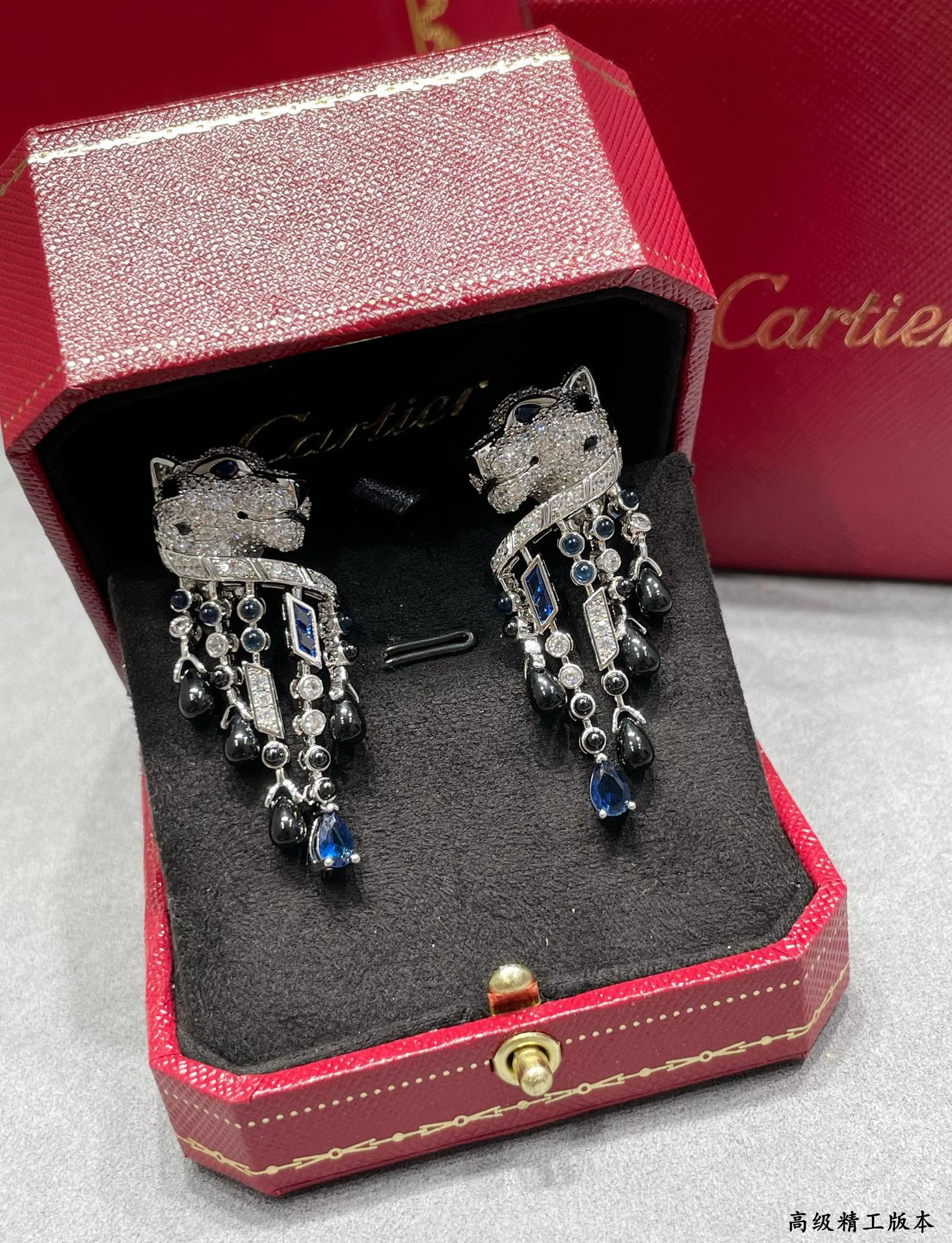 Ca*t*er Black Onyx Blue Diamond Leopard Earrings