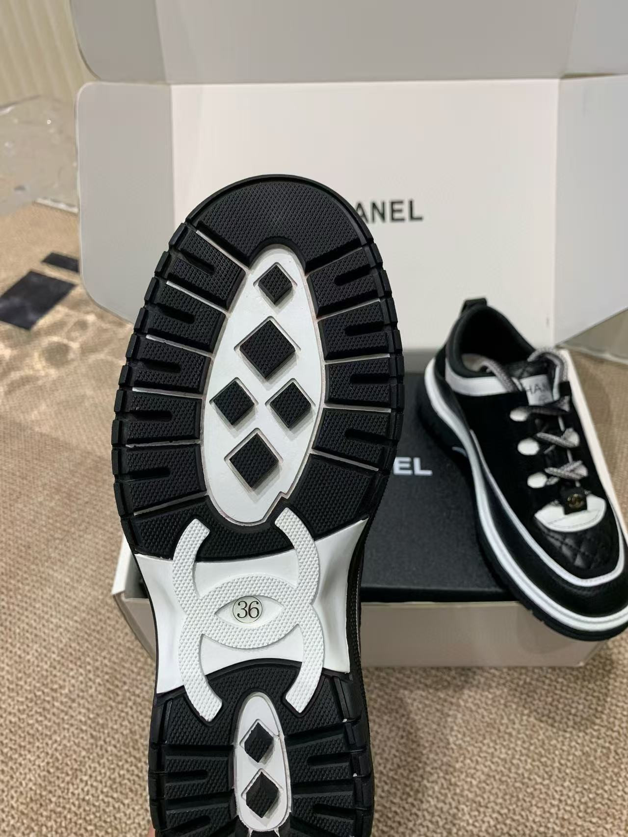 UA Ch*el Sneaker