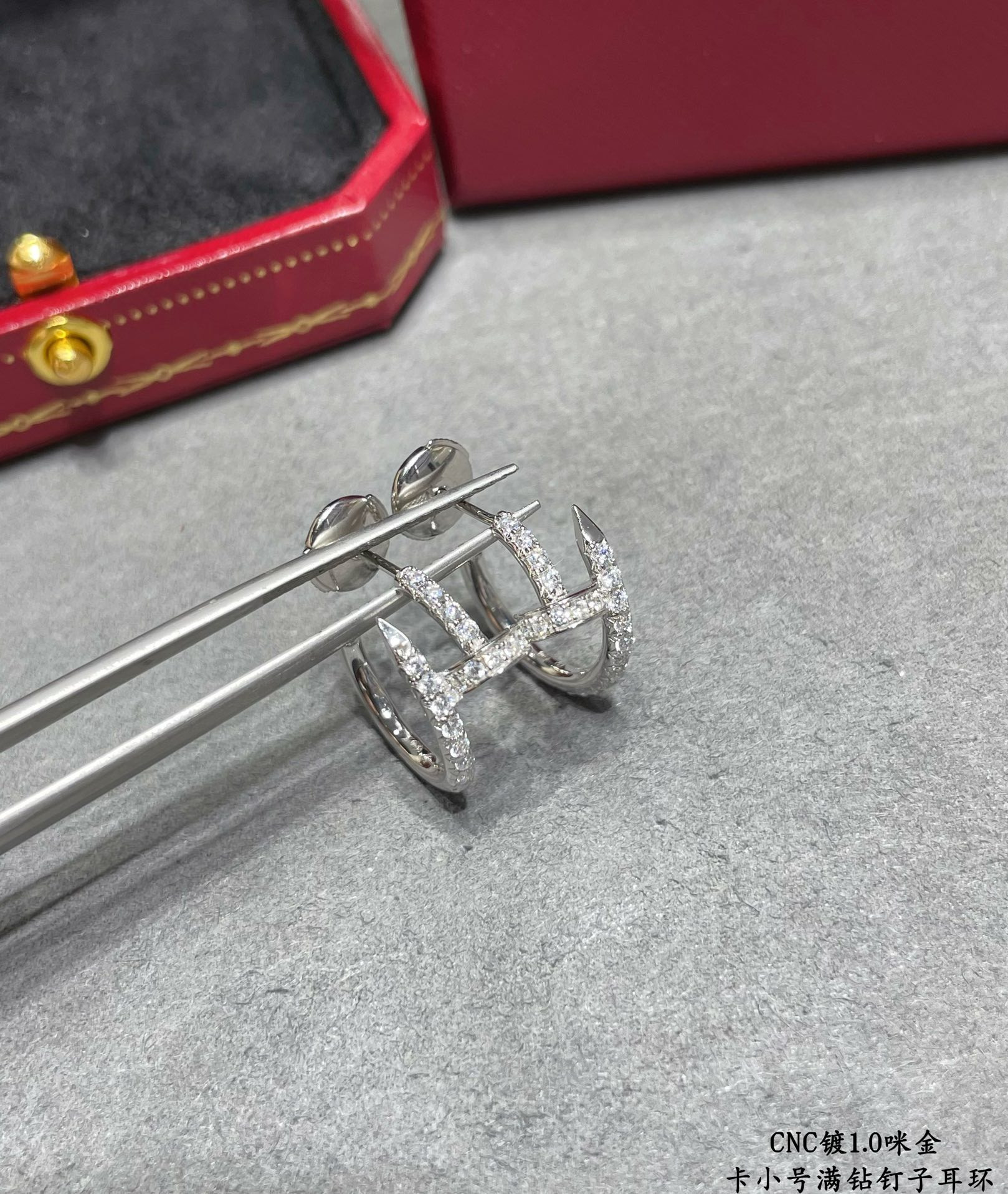 Ca*t*er Fully diamond-encrusted small nail Earrings