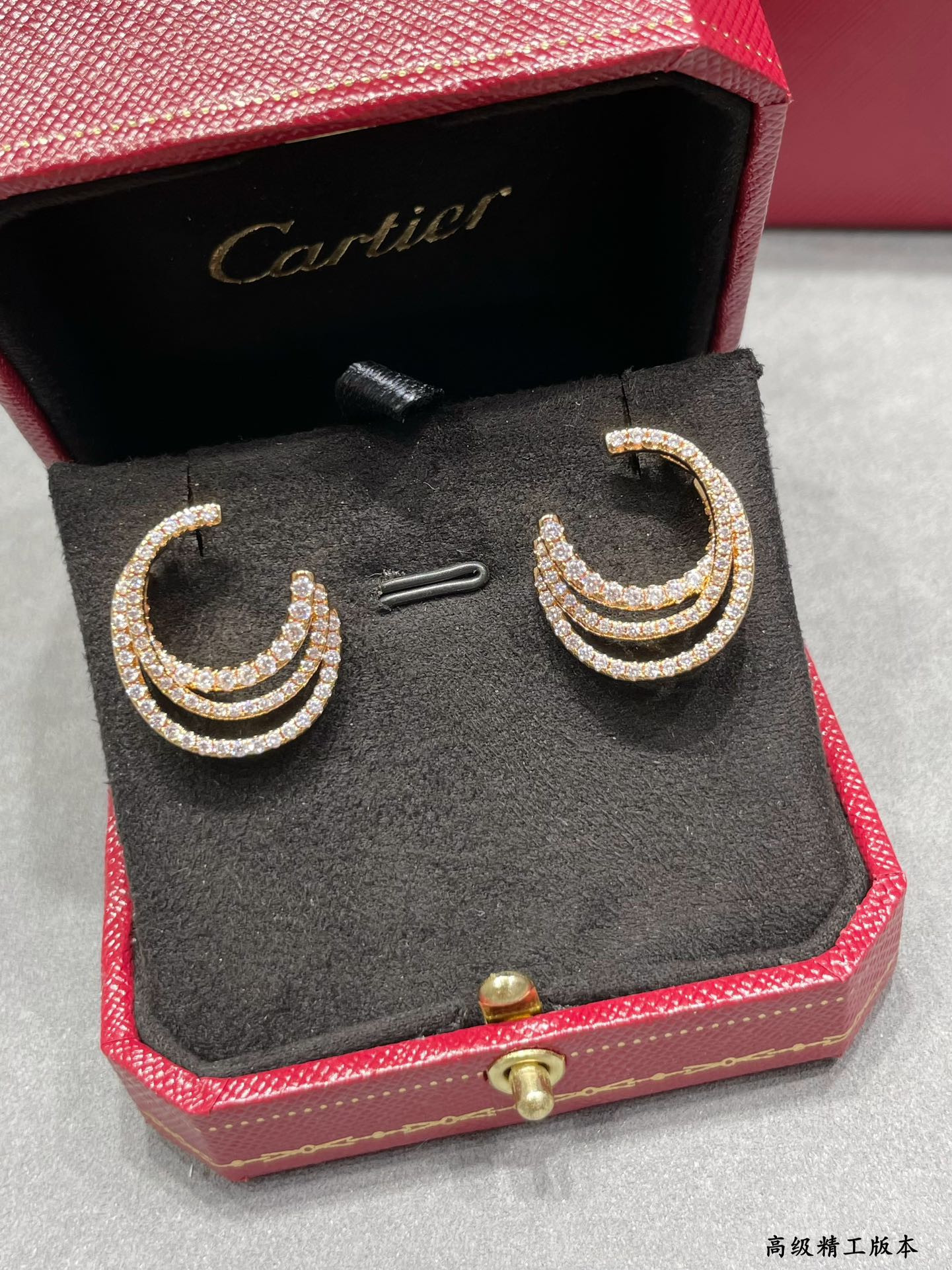 Ca*t*er three-circle full diamond earrings
