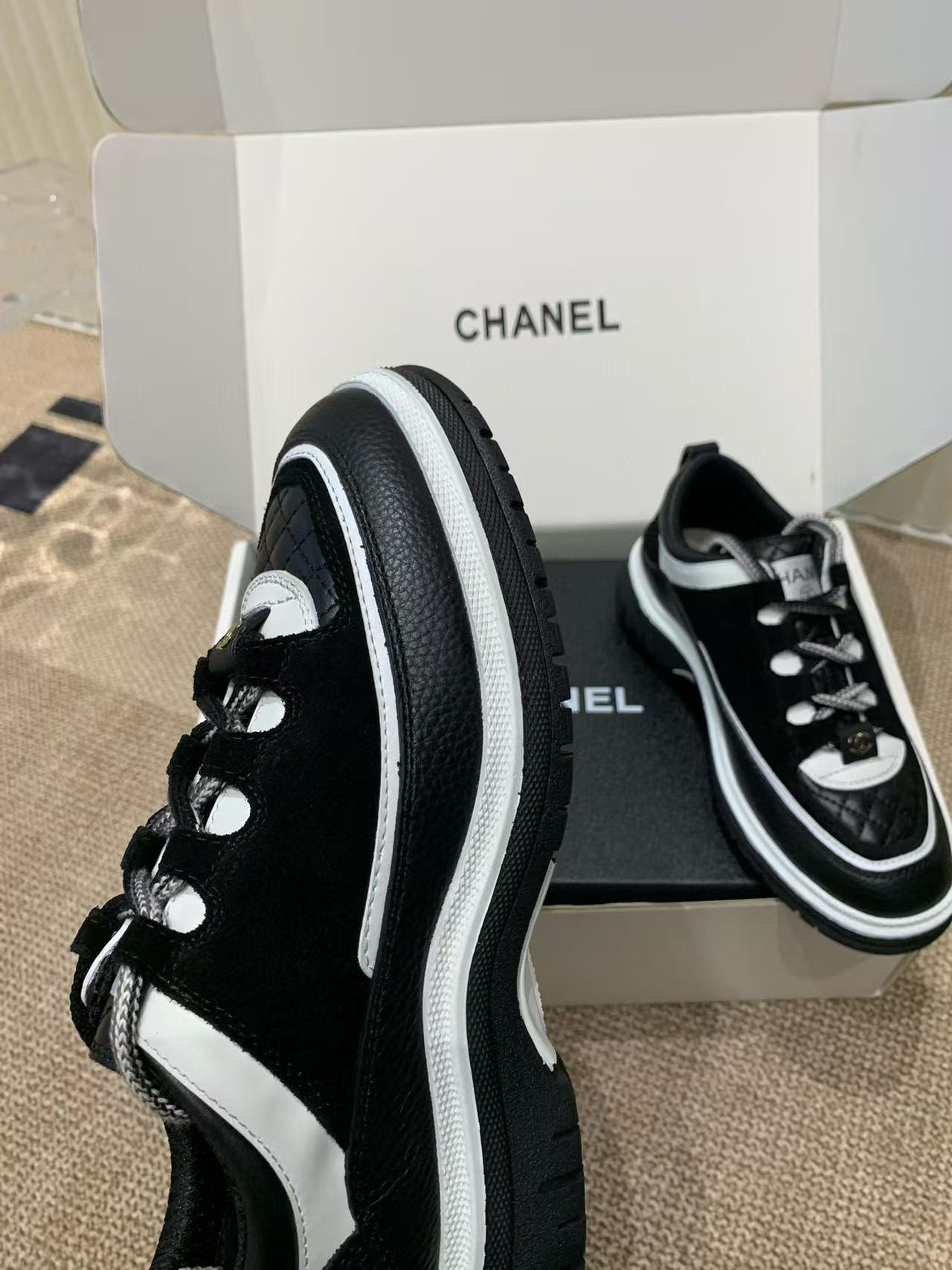 UA Ch*el Sneaker