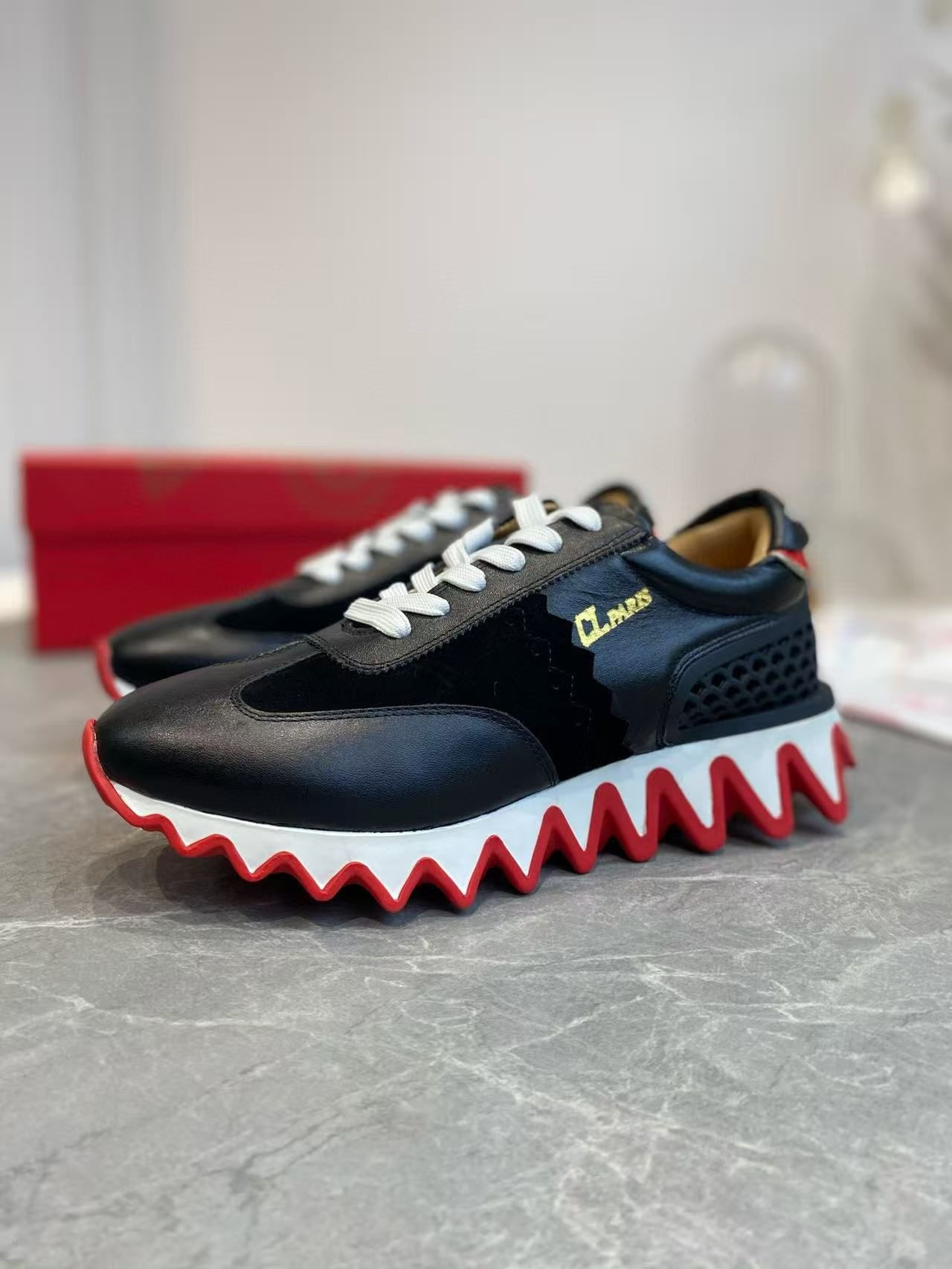 UA Ch**an Louboutin Loubishark Sneaker