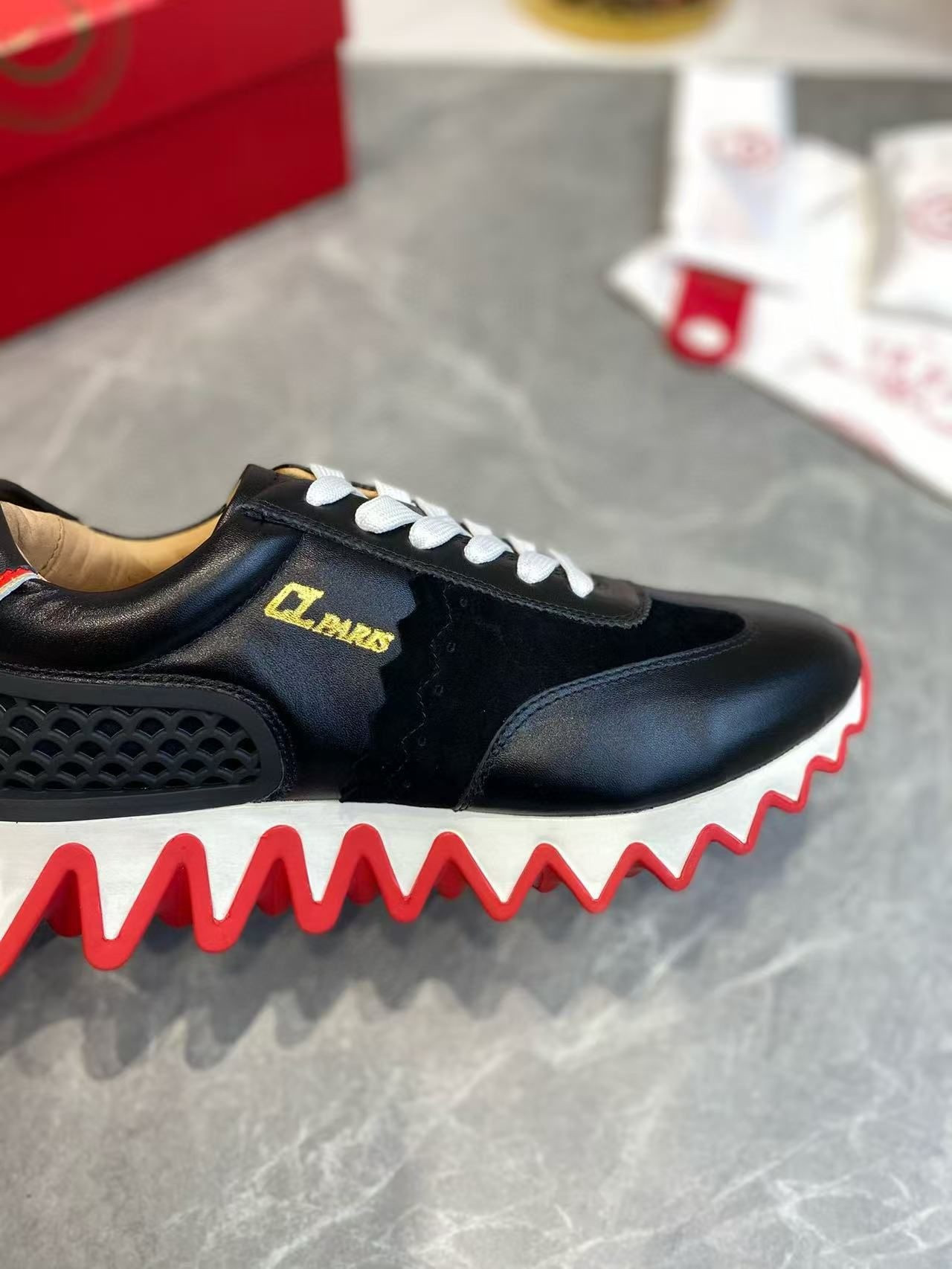 UA Ch**an Louboutin Loubishark Sneaker