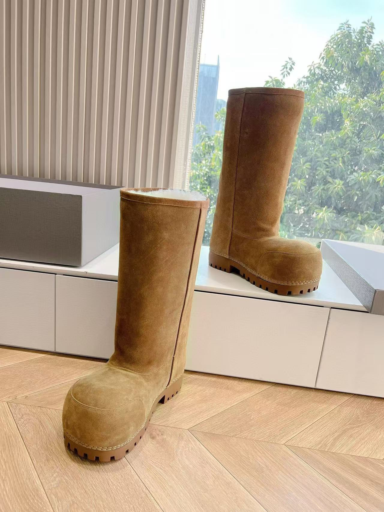 UA Ba*len*cia*ga Snow Boots