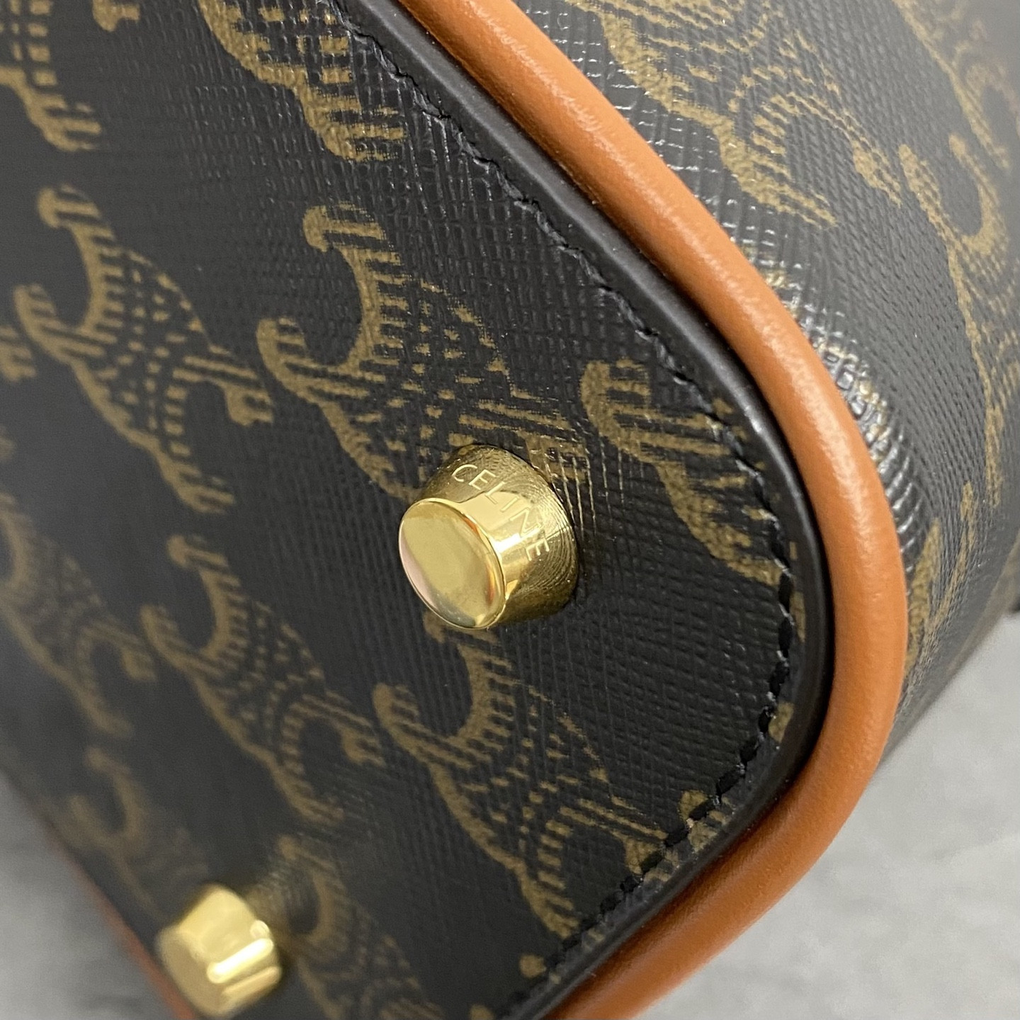 Ce**e Small Bowling in Triomphe canvas and calfskin 25x17x10cm